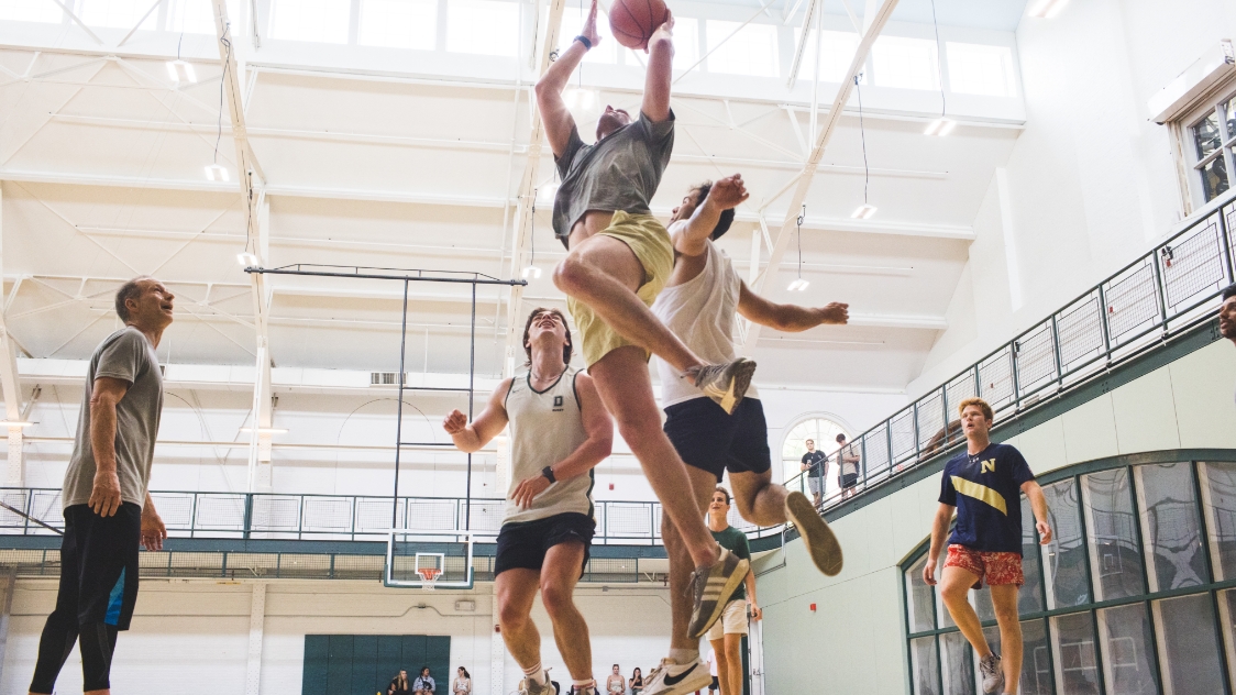 Dartmouth students playing pick up basketball