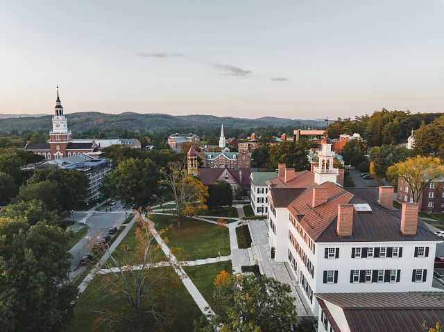 Fall aerial drone shot of campus including Dartmouth Hall and Baker Tower.