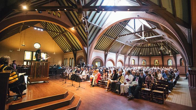 A full congregation attends a service at the William Jewett Tucker Center