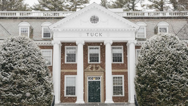 Photo of the Tuck building covered in snow