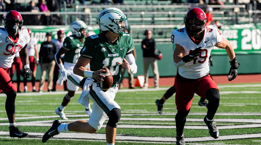 Dartmouth football player running with ball in hand