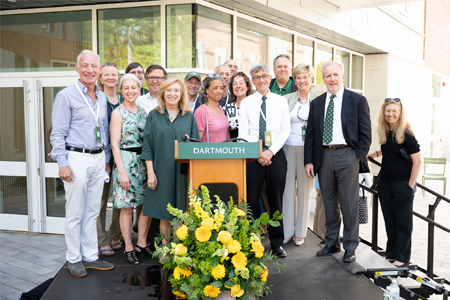 Dartmouth leadership standing in front of the new ECSC building