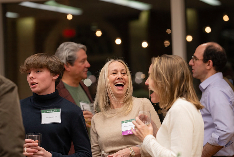Two women laughing at a Dartmouth event