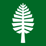 A white Dartmouth pine logo in a green box