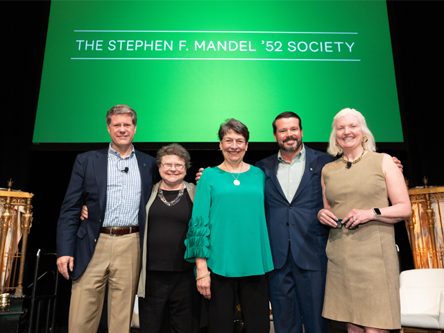This year’s Mandel Society winners in front of the screen at the honorary dinner