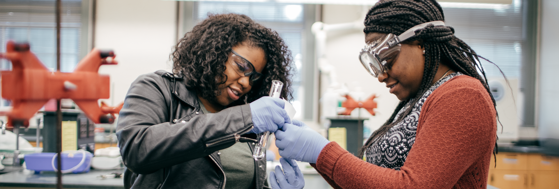 Students in the lab working with test tubes