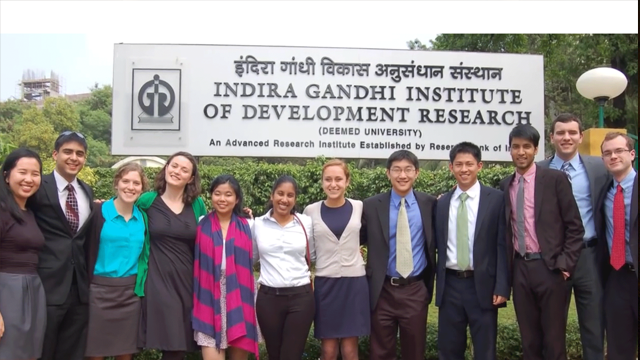 Students posing in front the Indira Gandhi Institute sign while studying abroad