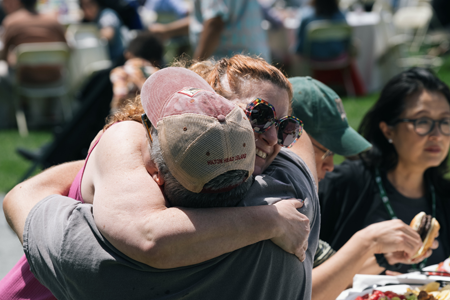 Alums embracing in a hug at Reunions 2024