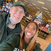 A man and a prospective Dartmouth student posing for a selfie.