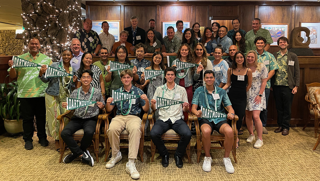 A group of prospective Dartmouth students posing for a photo at an admitted students event in Hawaii. 