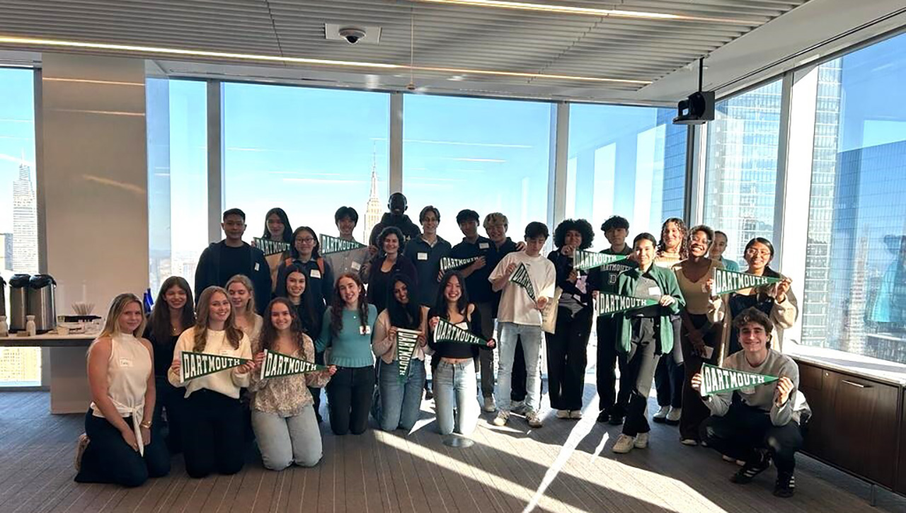 A group of prospective Dartmouth students posing for a photo at an admitted students event in San Francisco