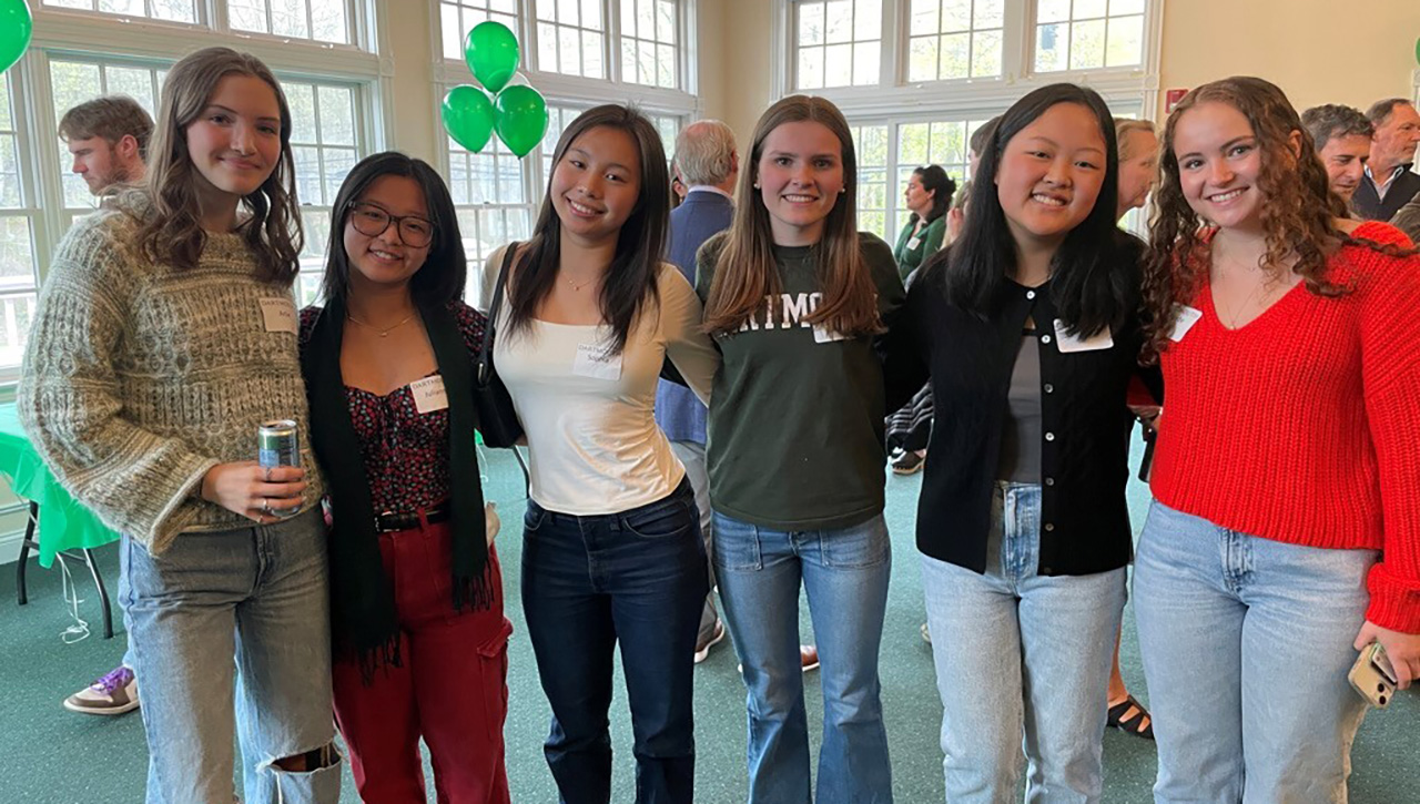 A group of prospective Dartmouth students posing for a photo at an admitted students event in Westchester.