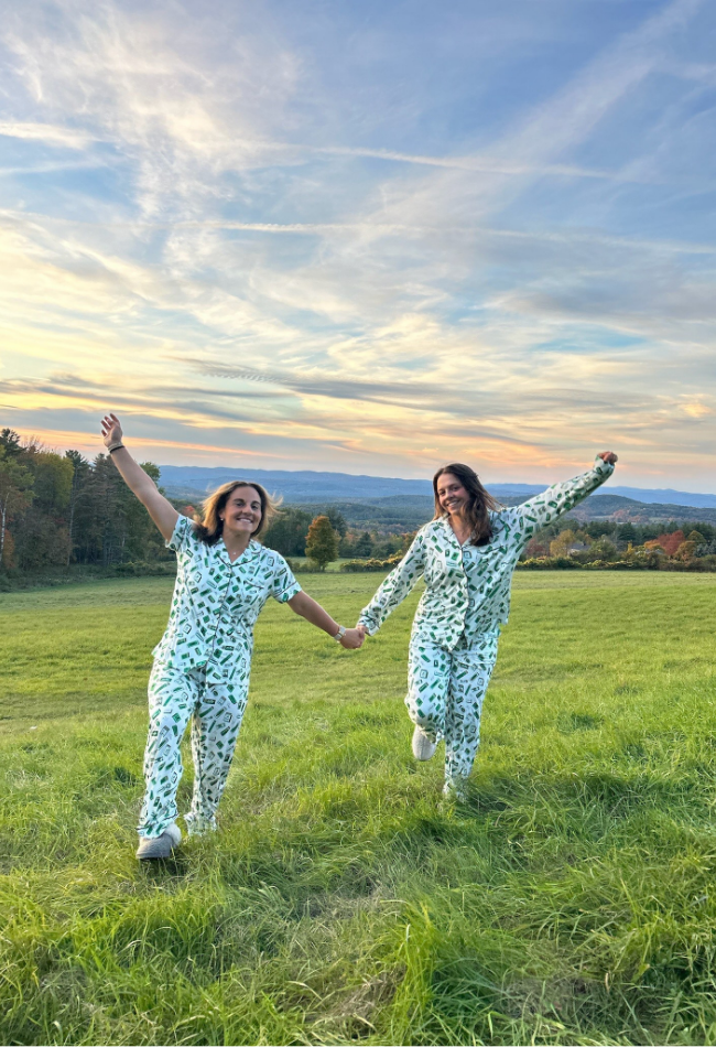 Two students wearing Sleepy Saturday pajamas