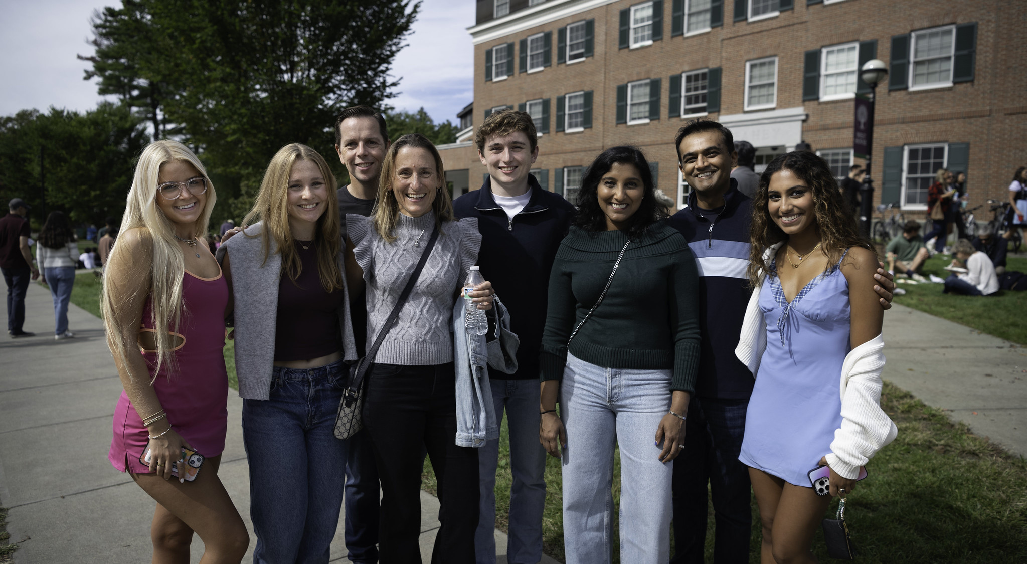 Several students and families posing together. 