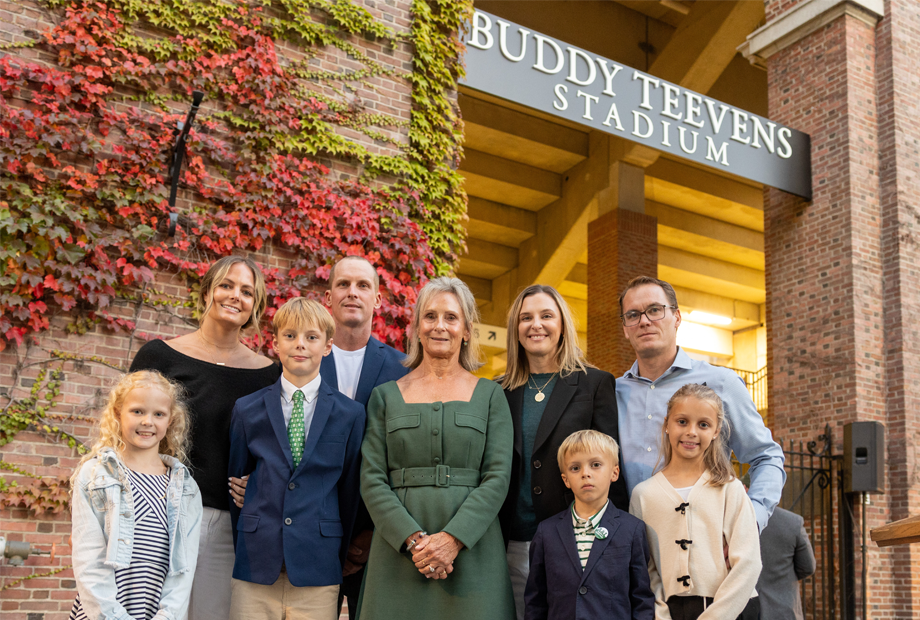 Teevens family posing outside new Buddy Teevens Stadium