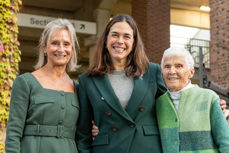 President Sian Leah Beilock and members of the Teevens family posing outside of stadium