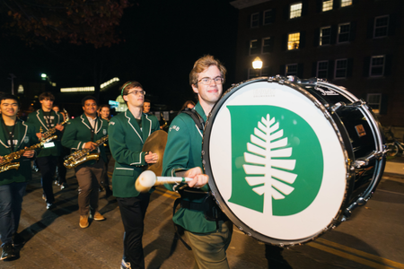 The DCMB bass drum with a printed D pine logo.