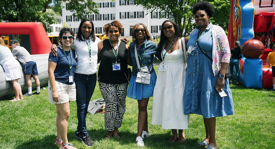 A group of women posing for a photo at a reunions event on the Green