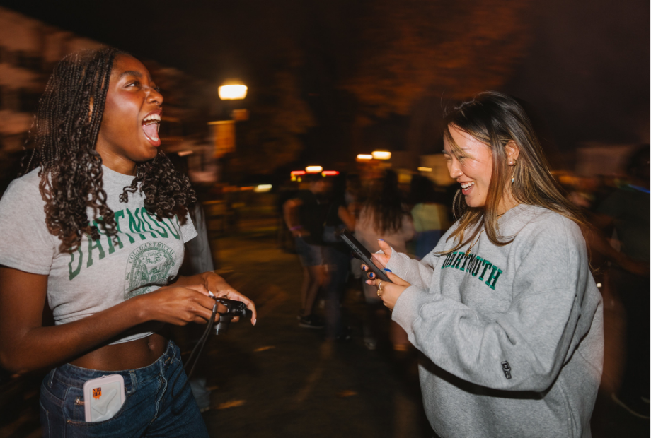 Two students at the bonfire.