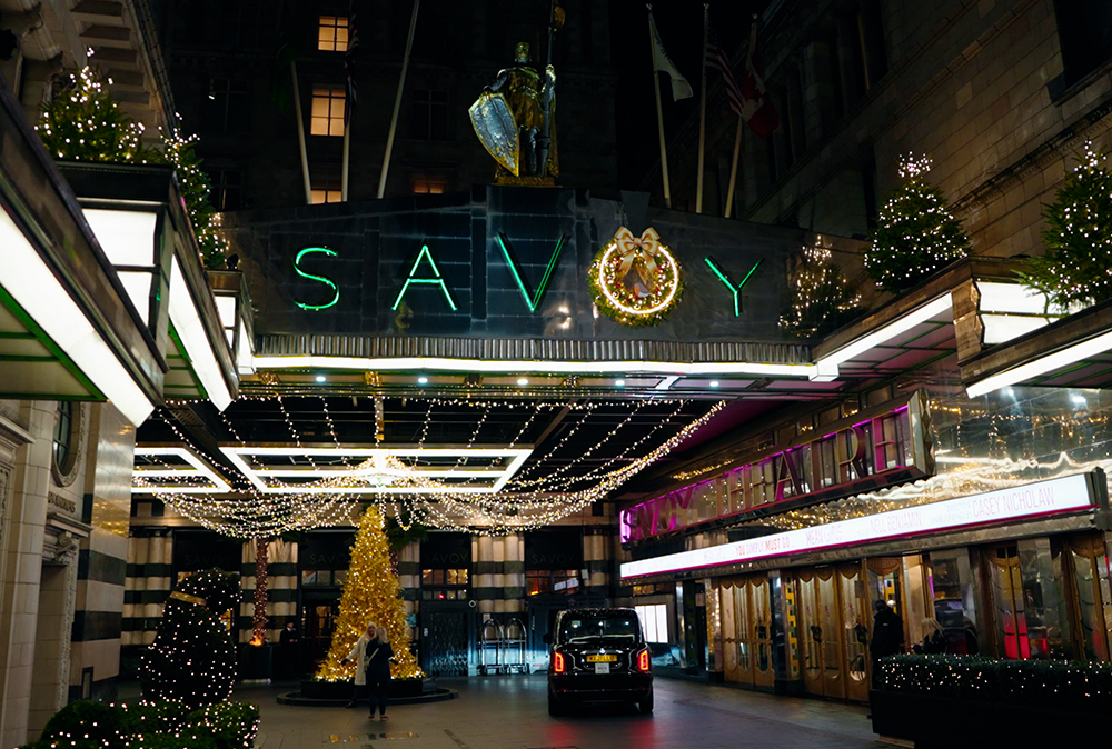 Exterior shot of the Savoy hotel decorated for the holidays