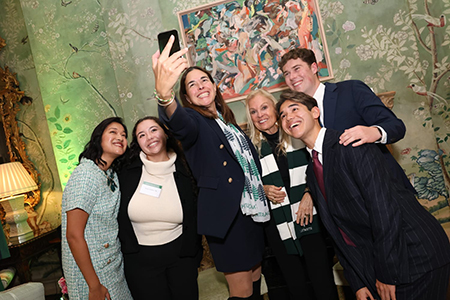 President Beilock takes a selfie with the Ambassador, Embassy staff, and FSP students