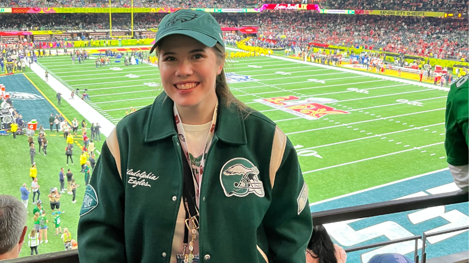 Isabel Pantle 23 posing for a photo in her Eagles gear in Caesars Super Dome on Super Bowl game day. 