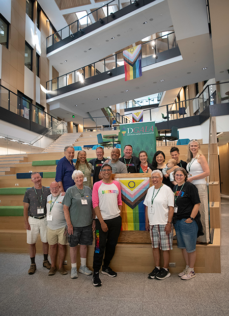 Members of DGALA posing or a photo at the Reunions breakfast gathering