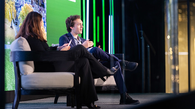 Ben Vagle seated having a conversation with Sian Beilock