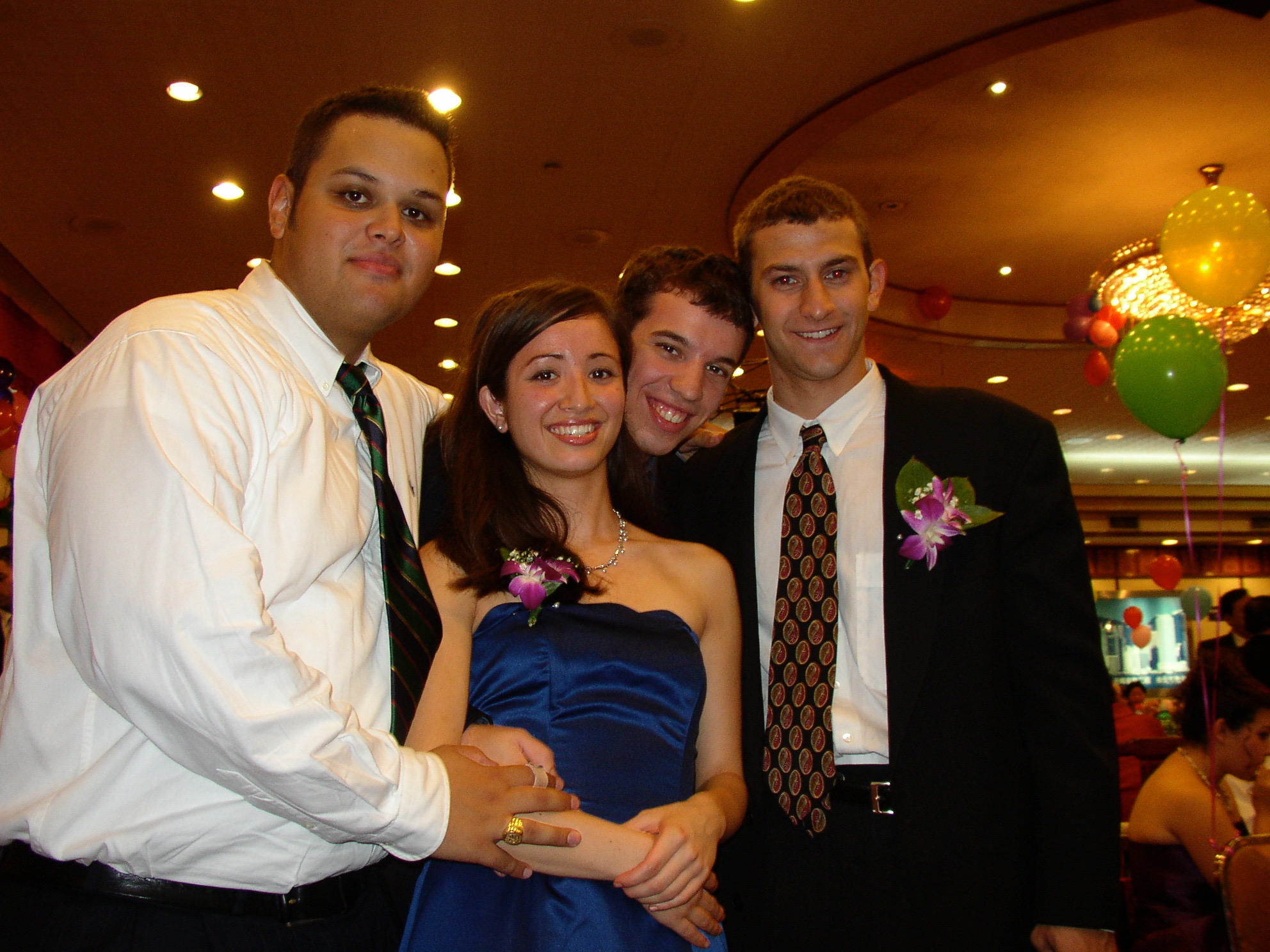 Four friends at a formal party