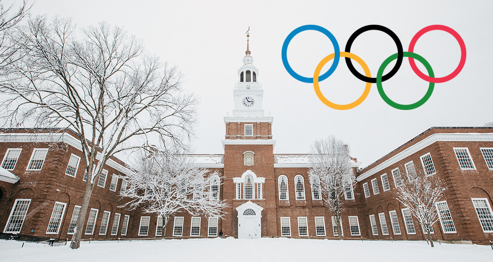 Olympic ring logo overlay on snowy image of Baker Tower