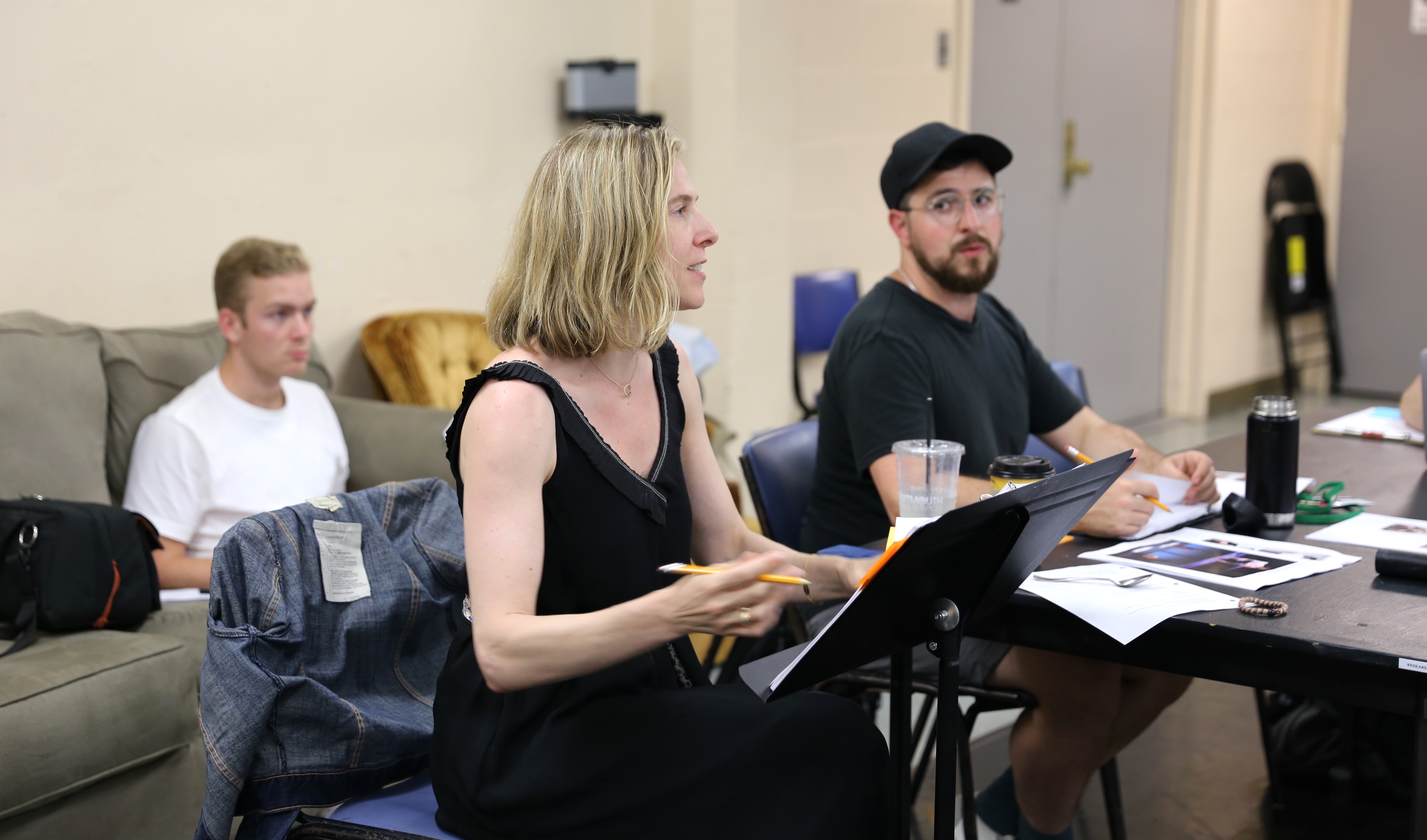 Carolyn Cantor '93 directs actors during a rehearsal at the Hop.