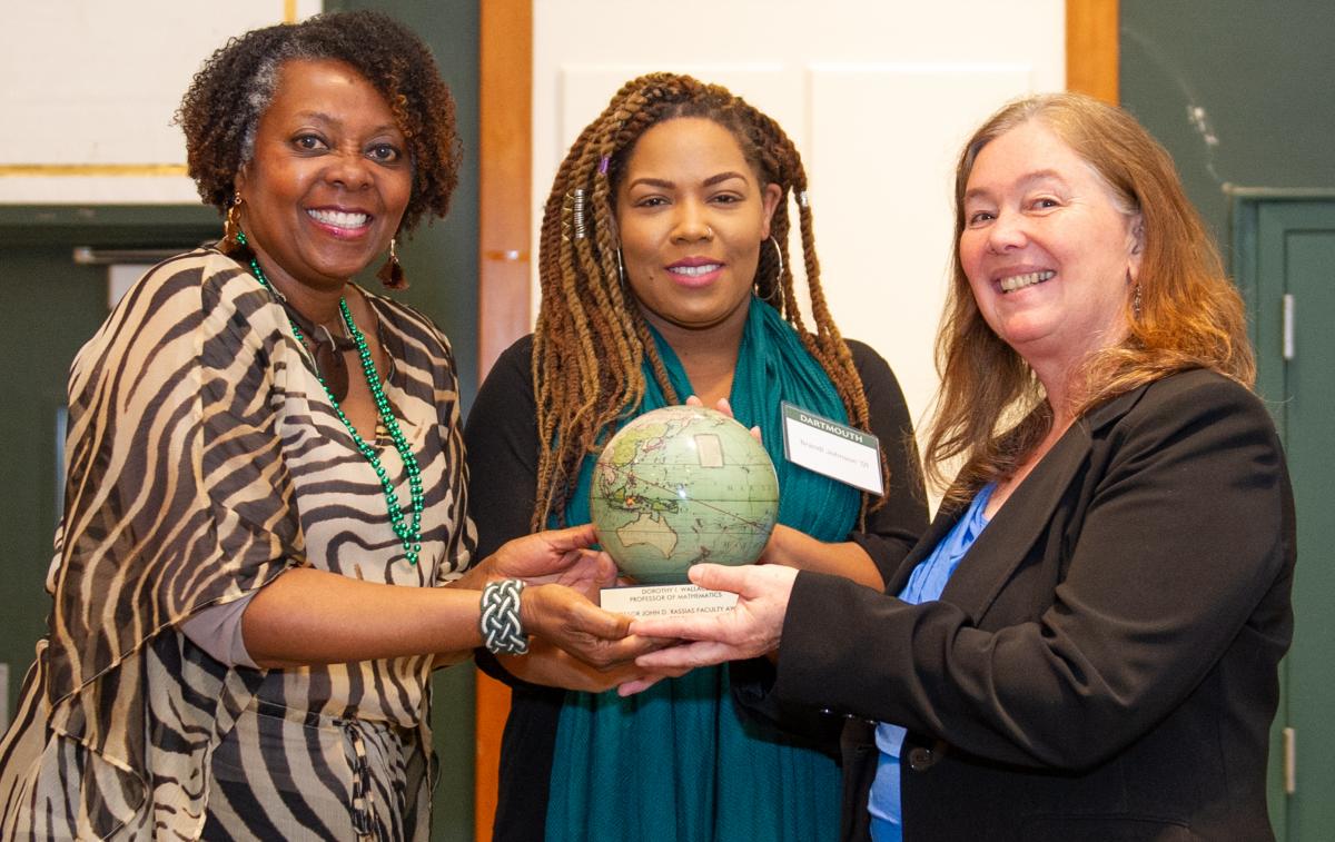 Adrienne "Lee" Toston '82, Brandi Johnson '01, and Dorothy Wallace pose with Rassias Award