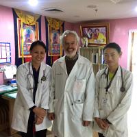 Neal Rakov ’74 does the rounds with a resident and a first-year med student in Bhutan. 
